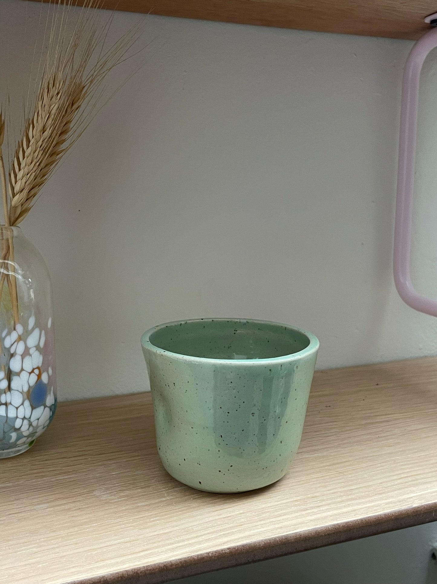 Koffiemok met een deukje- regenboog