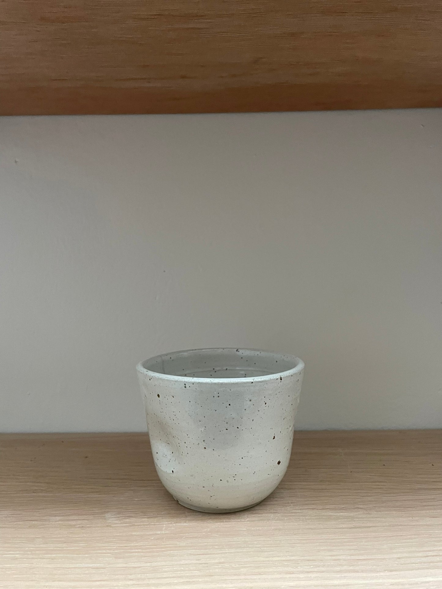 Koffiemok met een deukje- regenboog